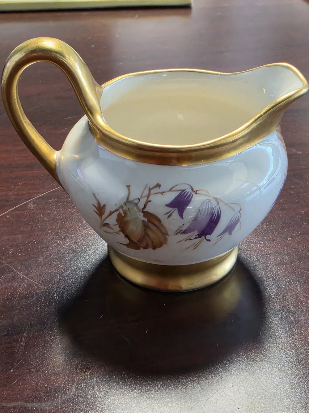 Porcelain Creamer Pitcher with Gold Trim and Floral Motif